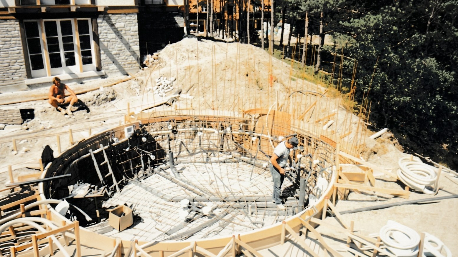 A pool going in — Rebar, formwork, and one summer